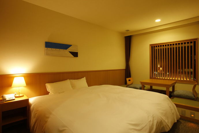 Imagen del bar/restaurante del Hotel Bayside Square Kaike. Foto 6