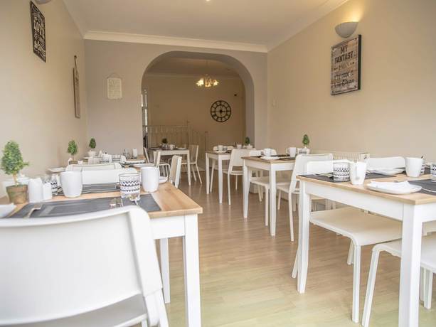 Imagen del bar/restaurante del Hotel Baytrees. Foto 5