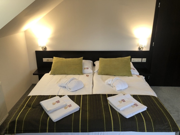 Imagen de la habitación del Hotel Bazilika Alatt Panzió. Foto 10