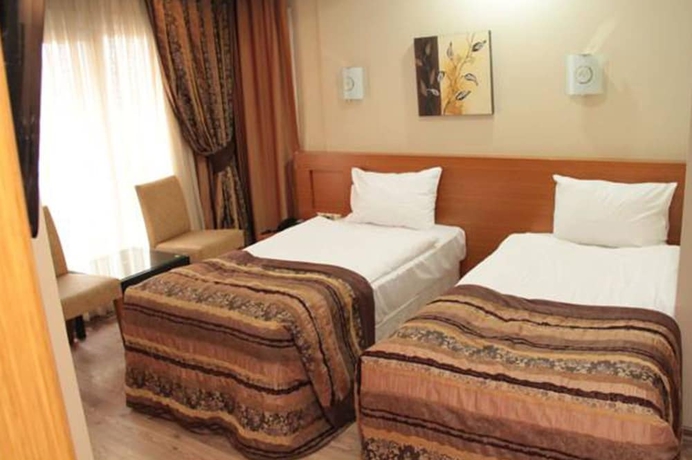 Imagen de la habitación del Hotel Bc Burhan Cacan and Spa and Cafe. Foto 7
