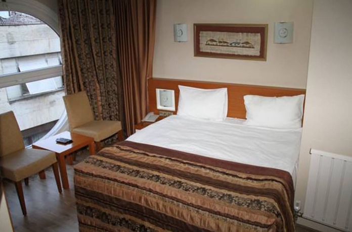 Imagen de la habitación del Hotel Bc Burhan Cacan and Spa and Cafe. Foto 8