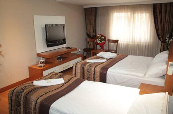Imagen de la habitación del Hotel Bc Burhan Cacan and Spa and Cafe. Foto 12