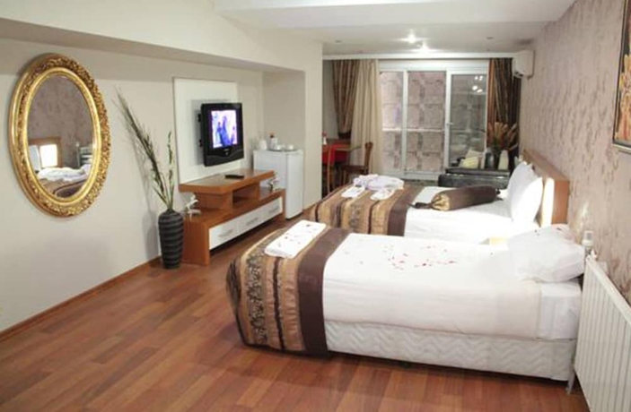 Imagen de la habitación del Hotel Bc Burhan Cacan and Spa and Cafe. Foto 13