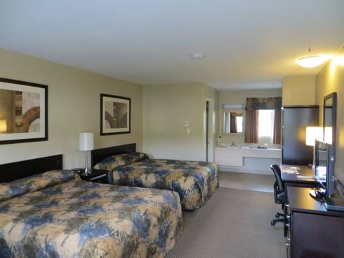 Imagen de la habitación del Hotel Bcminns Coleman. Foto 14