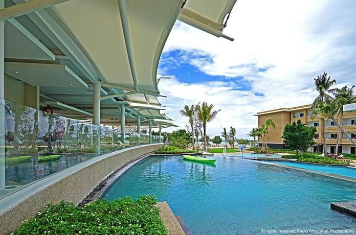 Imagen de la piscina del Hotel Be Grand Resort Bohol. Foto 12