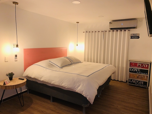 Imagen de la habitación del Hotel Be Happy. Foto 7