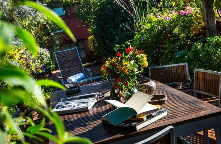 Imagen del bar/restaurante del Hotel Be Jardin Escondido By Coppola. Foto 4