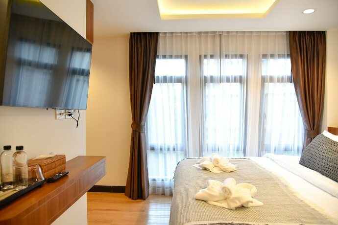 Imagen de la habitación del Hotel Be Phrasingh Chiang Mai. Foto 17