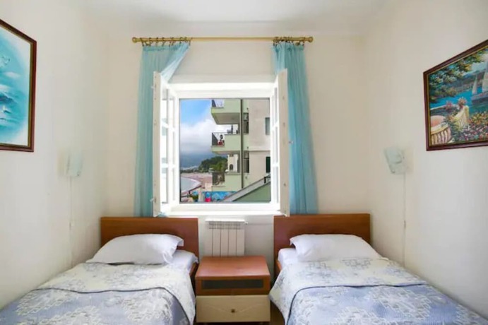 Imagen de la habitación del Hotel Beach Apartments Montesan. Foto 11