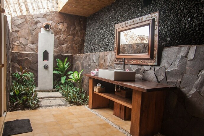 Imagen de la habitación del Hotel Beach Balcony Ocean View Villa. Foto 8