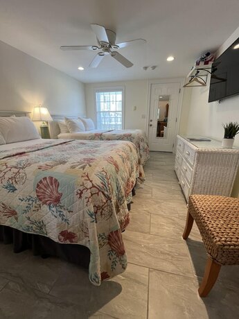 Imagen de la habitación del Hotel Beach Breeze Inn. Foto 18