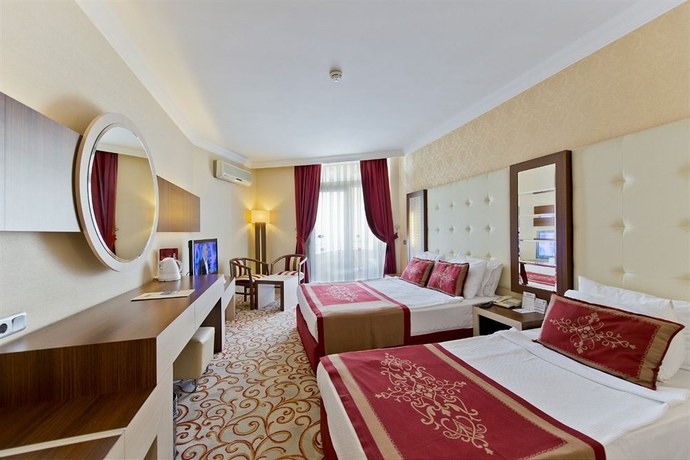 Imagen de la habitación del Hotel Beach Club Doğanay. Foto 7