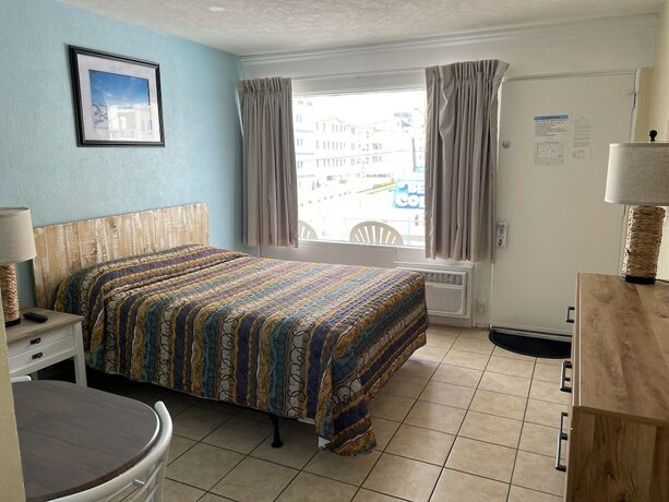 Imagen de la habitación del Hotel Beach Colony Motel. Foto 14