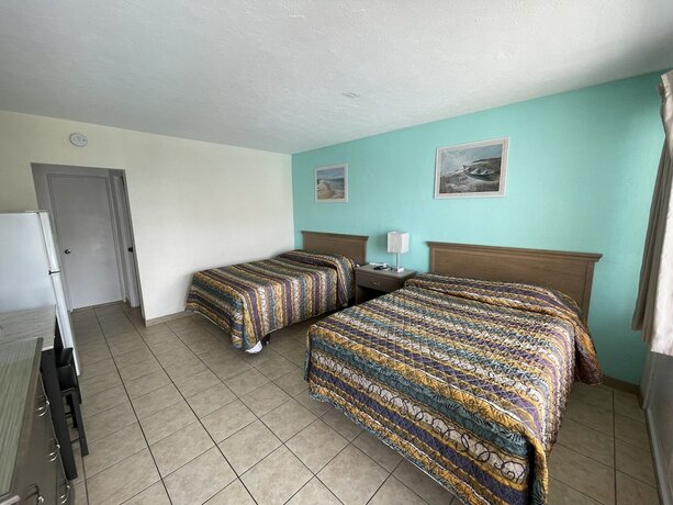 Imagen de la habitación del Hotel Beach Colony Motel. Foto 16