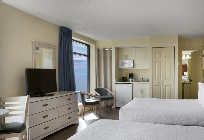 Imagen de la habitación del Hotel Beach Colony Resort. Foto 18