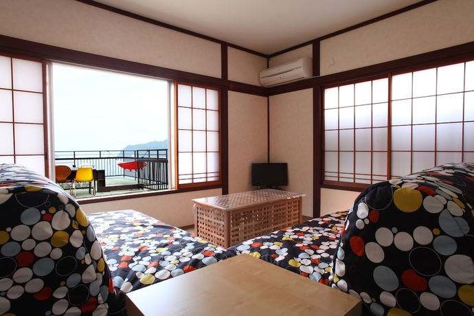 Imagen de la habitación del Hotel Beach Commune Simploose. Foto 15