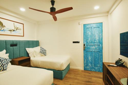 Imagen de la habitación del Hotel Beach Dhigurah. Foto 17