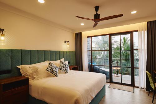 Imagen de la habitación del Hotel Beach Dhigurah. Foto 18