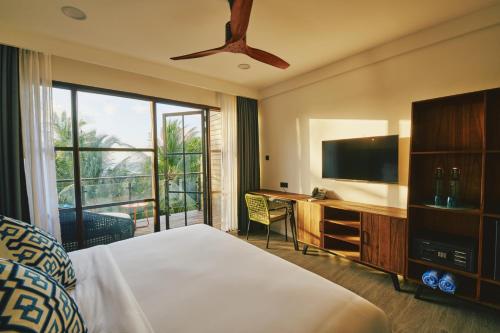 Imagen de la habitación del Hotel Beach Dhigurah. Foto 19