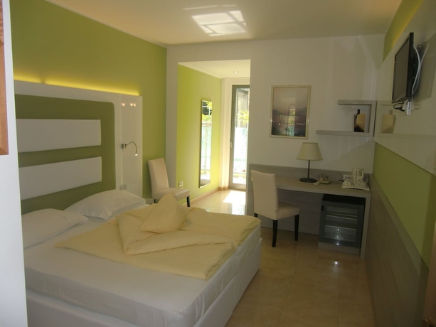 Imagen de la habitación del Hotel Beach Du Lac. Foto 7