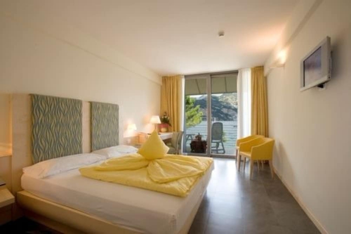 Imagen de la habitación del Hotel Beach Du Lac. Foto 12