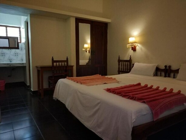 Imagen de la habitación del Hotel Beach Florra Inn. Foto 30