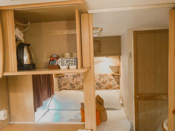 Imagen de la habitación del Hotel Beach House Camp. Foto 11