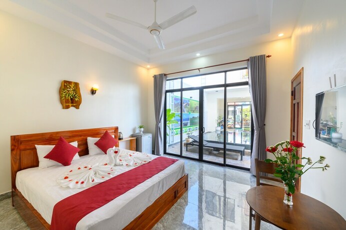 Imagen de la habitación del Hotel Beach Palm Villa Hoi An. Foto 20