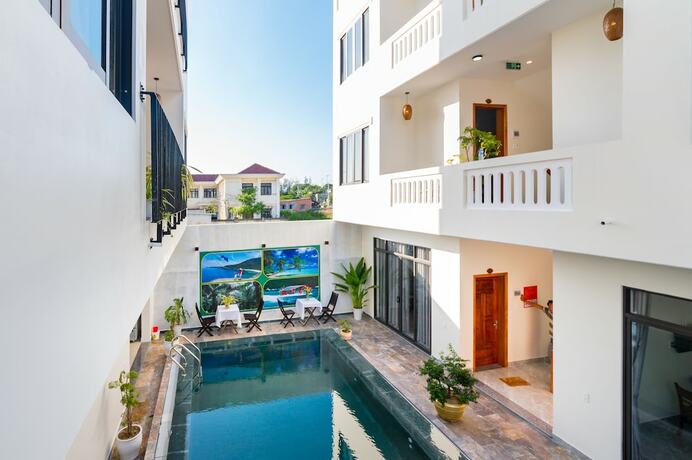 Imagen de la piscina del Hotel Beach Palm Villa Hoi An. Foto 34
