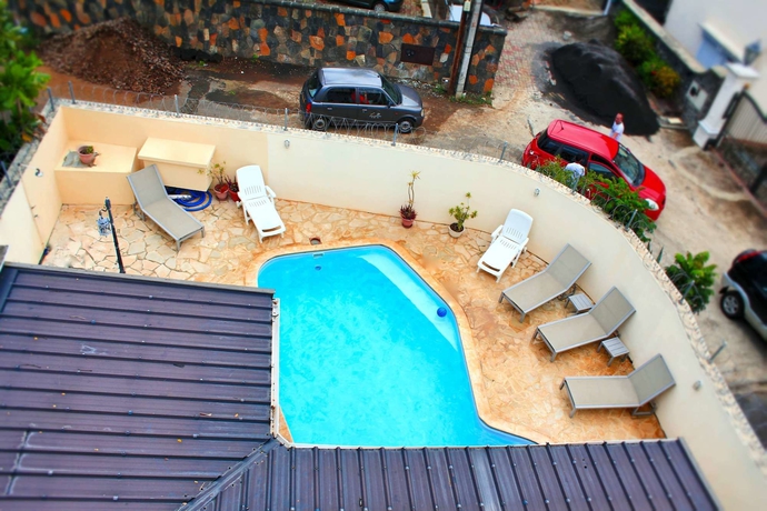 Imagen de la piscina del Hotel Beach Paradise Villas. Foto 14