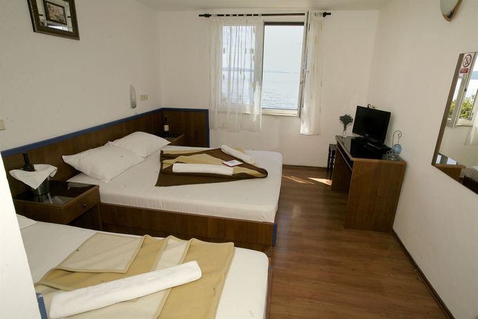 Imagen de la habitación del Hotel Beach Plaza, PODGORA. Foto 6