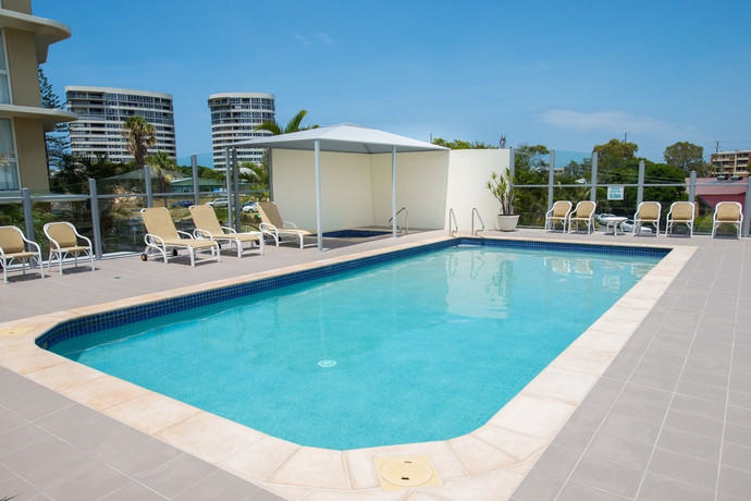Imagen de la piscina del Hotel Beachcomber International Resort. Foto 16