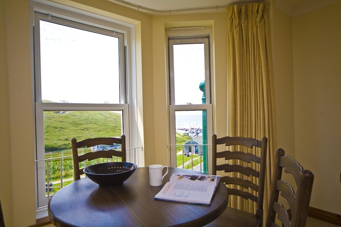 Imagen de la habitación del Hotel Beachcombers Apartments. Foto 7