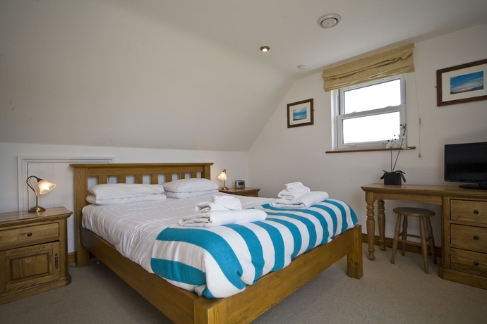 Imagen de la habitación del Hotel Beachcombers Apartments. Foto 8