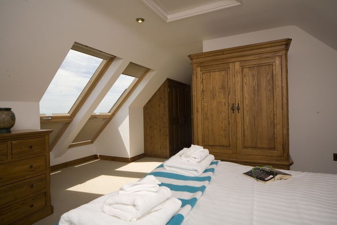 Imagen de la habitación del Hotel Beachcombers Apartments. Foto 9