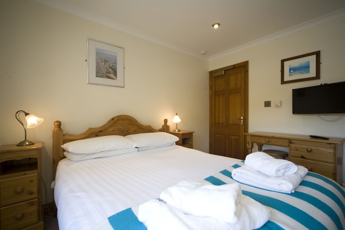 Imagen de la habitación del Hotel Beachcombers Apartments. Foto 16