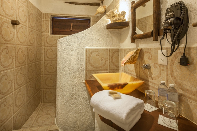 Imagen de la habitación del Hotel Beachfront La Palapa - Adults Only. Foto 3