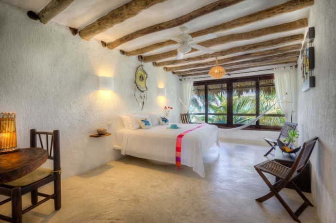 Imagen de la habitación del Hotel Beachfront La Palapa - Adults Only. Foto 4