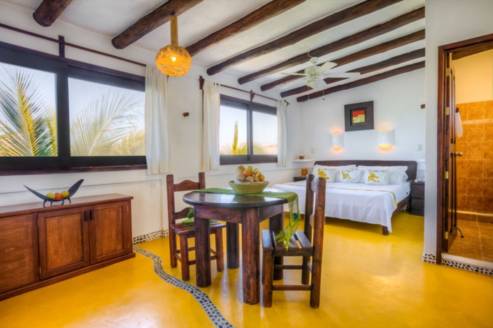 Imagen de la habitación del Hotel Beachfront La Palapa - Adults Only. Foto 6