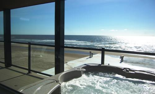 Imagen de la habitación del Hotel Beachfront Manor. Foto 5
