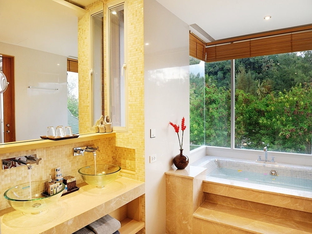 Imagen de la habitación del Hotel Beachfront Phuket. Foto 2