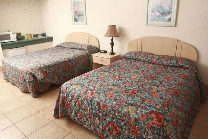 Imagen de la habitación del Hotel Beachfront Resort. Foto 20