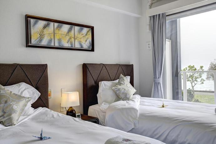 Imagen de la habitación del Hotel Beachfront Tower Mihama byDSH. Foto 6
