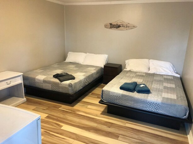 Imagen de la habitación del Hotel Beachfront at Beach1 Motel. Foto 20