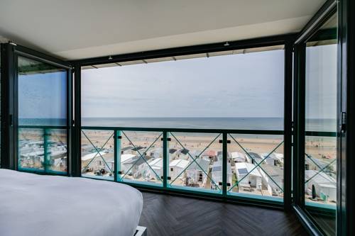 Imagen de la habitación del Hotel Beachhouse. Foto 12