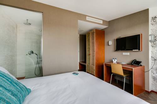 Imagen de la habitación del Hotel Beachhouse. Foto 15