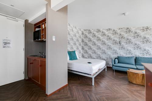 Imagen de la habitación del Hotel Beachhouse. Foto 16