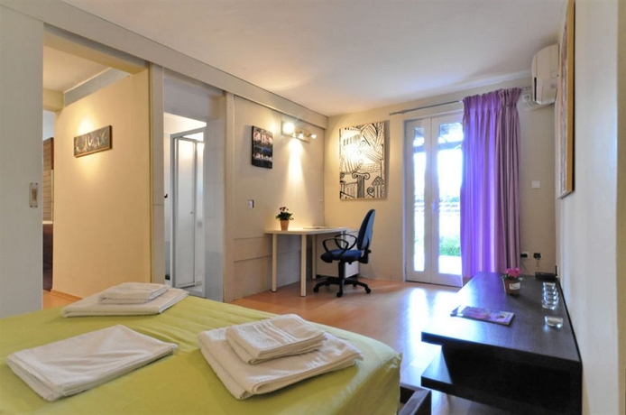 Imagen de la habitación del Hotel Beachside Bungalows. Foto 5
