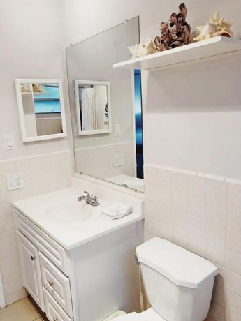 Imagen de la habitación del Hotel Beachside Gardens Apartments by Lowkl. Foto 10
