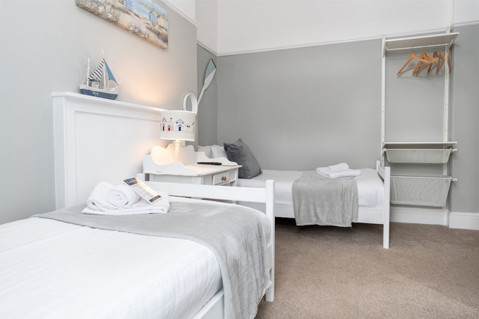 Imagen de la habitación del Hotel Beachside Guest House. Foto 13